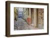 India, Varanasi a Man Walking Down a Stone Tiled Street in the Downtown Area-Ellen Clark-Framed Photographic Print