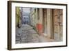 India, Varanasi a Man Walking Down a Stone Tiled Street in the Downtown Area-Ellen Clark-Framed Photographic Print