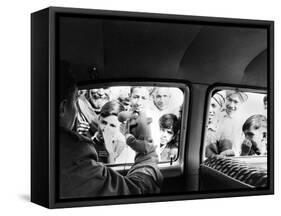 Indian children looking into puppeteer Bil Baird's car, March 1962.-James Burke-Framed Stretched Canvas