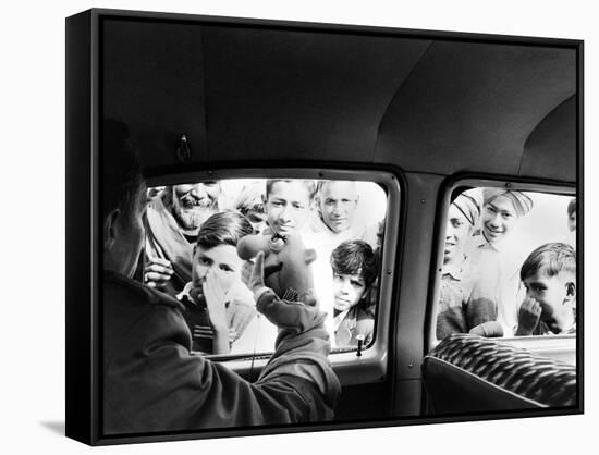 Indian children looking into puppeteer Bil Baird's car, March 1962.-James Burke-Framed Stretched Canvas