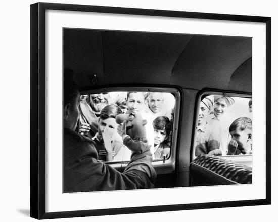 Indian children looking into puppeteer Bil Baird's car, March 1962.-James Burke-Framed Premium Photographic Print