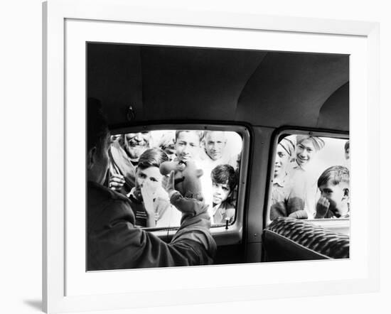 Indian children looking into puppeteer Bil Baird's car, March 1962.-James Burke-Framed Premium Photographic Print