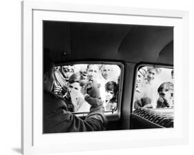 Indian children looking into puppeteer Bil Baird's car, March 1962.-James Burke-Framed Premium Photographic Print