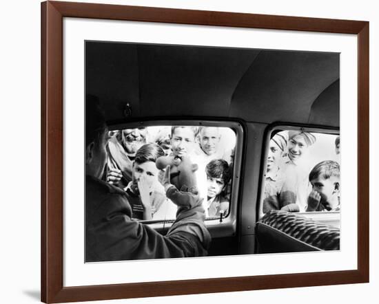 Indian children looking into puppeteer Bil Baird's car, March 1962.-James Burke-Framed Premium Photographic Print