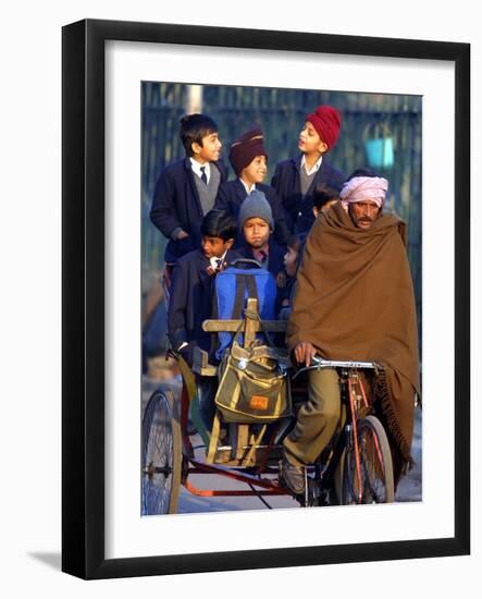 Indian Children Ride to School on the Back of a Cycle Rickshaw-null-Framed Photographic Print