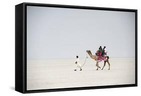 Indian Family Enjoying a Camel Ride in the White Desert-Annie Owen-Framed Stretched Canvas
