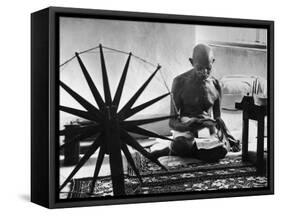 Indian Leader Mohandas Gandhi Reading as He Sits Cross Legged on Floor-Margaret Bourke-White-Framed Stretched Canvas