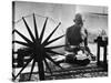 Indian Leader Mohandas Gandhi Reading as He Sits Cross Legged on Floor-Margaret Bourke-White-Stretched Canvas