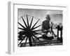 Indian Leader Mohandas Gandhi Reading as He Sits Cross Legged on Floor-Margaret Bourke-White-Framed Premium Photographic Print