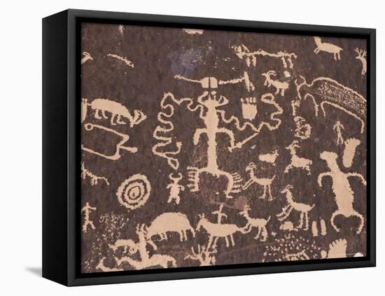 Indian Petroglyphs Drawn on Red Standstone by Scratching Away Dark Desert Varnish of Iron Oxides-Tony Waltham-Framed Stretched Canvas