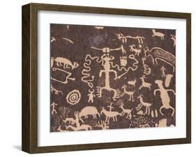 Indian Petroglyphs Drawn on Red Standstone by Scratching Away Dark Desert Varnish of Iron Oxides-Tony Waltham-Framed Photographic Print