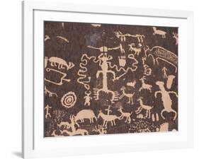 Indian Petroglyphs Drawn on Red Standstone by Scratching Away Dark Desert Varnish of Iron Oxides-Tony Waltham-Framed Photographic Print