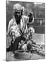 Indian Snake Charmer with Mongoose and Cobra, 1936-null-Mounted Giclee Print