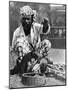 Indian Snake Charmer with Mongoose and Cobra, 1936-null-Mounted Giclee Print