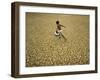 Indian Village Boy Runs Through a Parched Field on World Water Day in Berhampur, India-null-Framed Photographic Print