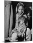 Indian Wife of a Tannery Worker Holding Her Child at Home in the Chawls-Margaret Bourke-White-Mounted Photographic Print