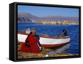 Indian Woman from the Uros or Floating Reed Islands of Lake Titicaca, Washes Her Pans in the Water -John Warburton-lee-Framed Stretched Canvas