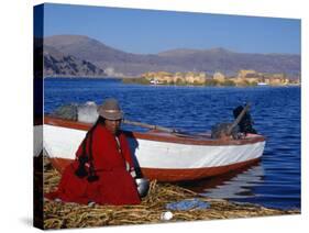 Indian Woman from the Uros or Floating Reed Islands of Lake Titicaca, Washes Her Pans in the Water -John Warburton-lee-Stretched Canvas