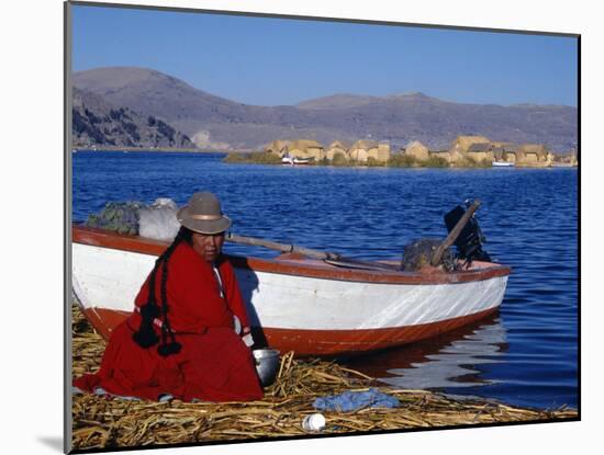 Indian Woman from the Uros or Floating Reed Islands of Lake Titicaca, Washes Her Pans in the Water -John Warburton-lee-Mounted Photographic Print