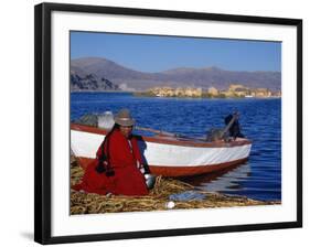 Indian Woman from the Uros or Floating Reed Islands of Lake Titicaca, Washes Her Pans in the Water -John Warburton-lee-Framed Photographic Print