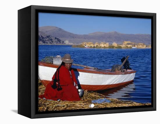 Indian Woman from the Uros or Floating Reed Islands of Lake Titicaca, Washes Her Pans in the Water -John Warburton-lee-Framed Stretched Canvas