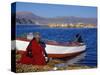 Indian Woman from the Uros or Floating Reed Islands of Lake Titicaca, Washes Her Pans in the Water -John Warburton-lee-Stretched Canvas