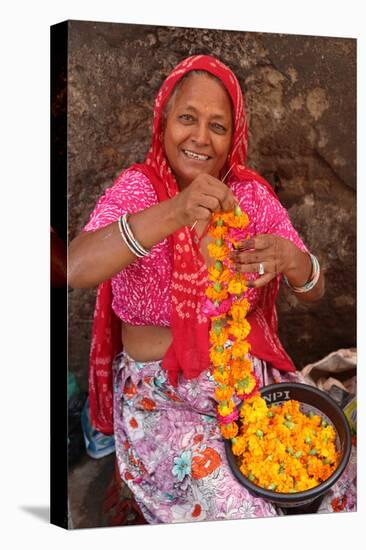 Indian woman making garlands in Ajmer, Rajasthan, India-Godong-Stretched Canvas