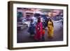 Indian women in colourful saris walk along streets-Charles Bowman-Framed Photographic Print