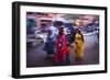 Indian women in colourful saris walk along streets-Charles Bowman-Framed Photographic Print