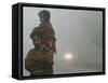 Indian Worker Carries His Daughter in the Morning Fog in the Outskirts of Jammu, India-null-Framed Stretched Canvas