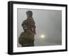 Indian Worker Carries His Daughter in the Morning Fog in the Outskirts of Jammu, India-null-Framed Photographic Print