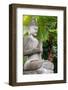 Indonesia, Bali. Buddha statue with green palms.-Cindy Miller Hopkins-Framed Photographic Print