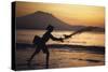 Indonesia, Bali, Silhouette of Fisherman Fishing at Sanur Beach-Dave Bartruff-Stretched Canvas