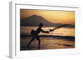 Indonesia, Bali, Silhouette of Fisherman Fishing at Sanur Beach-Dave Bartruff-Framed Photographic Print