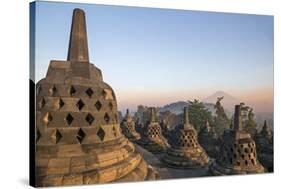 Indonesia, Java, Borobudur. Early Morning Sun Shines on the Dormant Stratovolcano-Nigel Pavitt-Stretched Canvas
