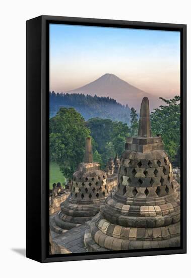 Indonesia, Java, Borobudur. Early Morning Sun Shines on the Dormant Stratovolcano-Nigel Pavitt-Framed Stretched Canvas