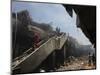 Indonesian Rescue Workers Walk on a Eartquake Damaged Building, in Padang, Indonesia-null-Mounted Photographic Print