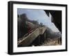 Indonesian Rescue Workers Walk on a Eartquake Damaged Building, in Padang, Indonesia-null-Framed Photographic Print