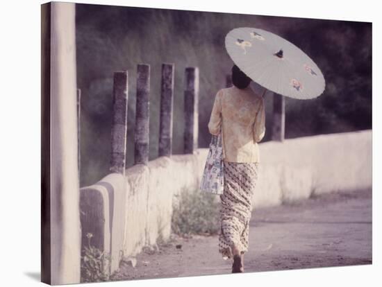 Indonesian Woman with a Parasol-Co Rentmeester-Stretched Canvas