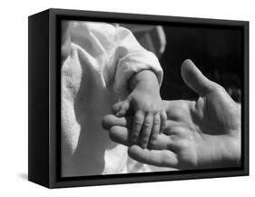 Infant's Hand in Man's Hand-Philip Gendreau-Framed Stretched Canvas