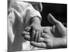 Infant's Hand in Man's Hand-Philip Gendreau-Mounted Photographic Print