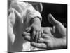 Infant's Hand in Man's Hand-Philip Gendreau-Mounted Photographic Print