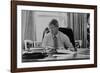 Informal Portrait of President Bill Clinton at His Desk in the Oval Office-null-Framed Photo