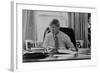 Informal Portrait of President Bill Clinton at His Desk in the Oval Office-null-Framed Photo