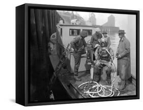 Inspecting the Piles at Tacoma, Diver on Deck in Suit, 1924-Asahel Curtis-Framed Stretched Canvas