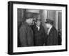 Interaction Between Serious Man and Teenage Boy-null-Framed Photo