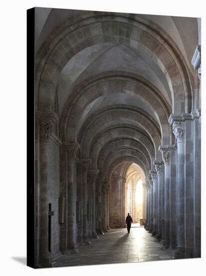 Interior North Nave Aisle with Priest Walking Away, Vezelay Abbey, UNESCO World Heritage Site, Veze-Nick Servian-Stretched Canvas
