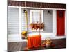 Interior of an Autumn Patio. Swing is Adorned with Autumn Leaves and Orange Knitted Plaid. Basket W-null-Mounted Photographic Print
