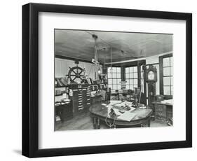 Interior of an Office with a Man on the Telephone, Greenwich, London, November 1936-null-Framed Photographic Print