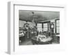 Interior of an Office with a Man on the Telephone, Greenwich, London, November 1936-null-Framed Photographic Print